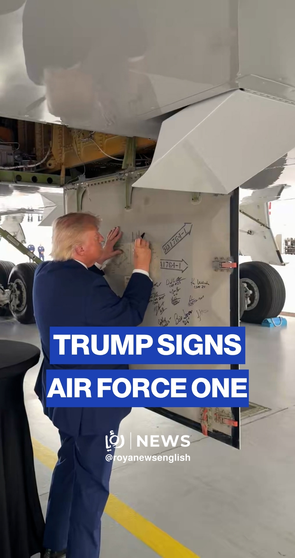 Trump signs structural panel of newly unveiled Air Force One