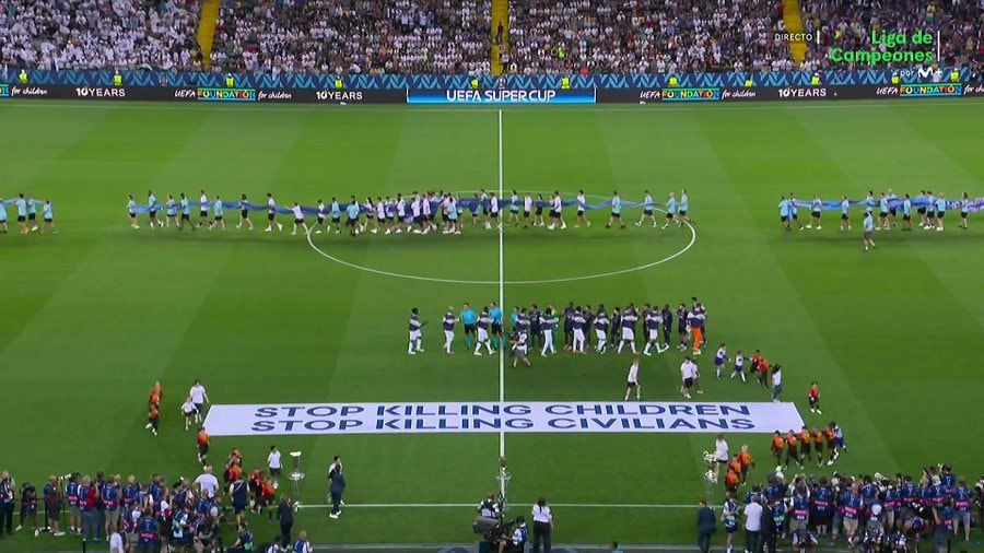 Roya News | UEFA displays “stop killing children” banner in Super Cup final with no mention of Gaza