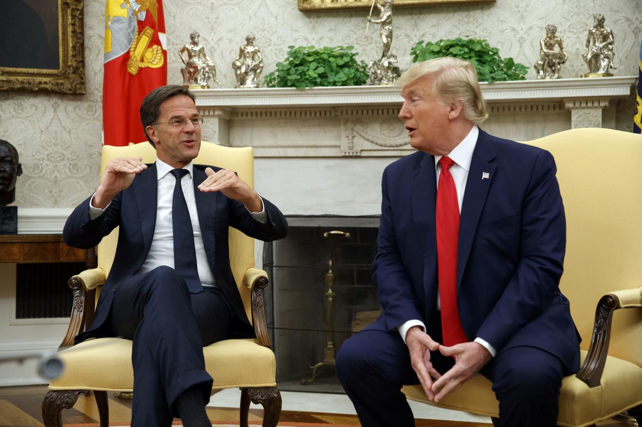 US President Donald Trump speaks with NATO&rsquo;s Secretary-General Mark Rutte